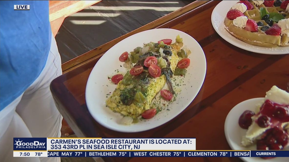Jenn checks out what is on the menu at Carmen's Seafood in Sea Isle City